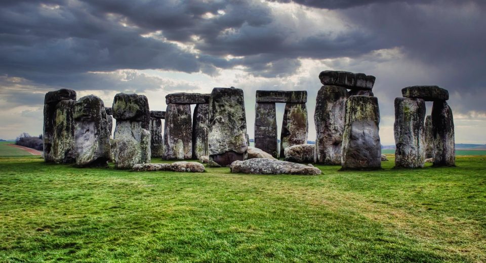 high contrast shot stonehenge stones sailsbury uk cloudy rainy day with green grass