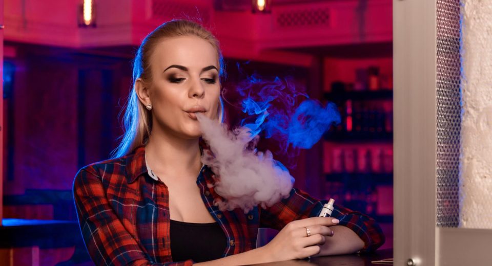 young pretty woman shirt cage smoke electronic cigarette vape bar vape shop